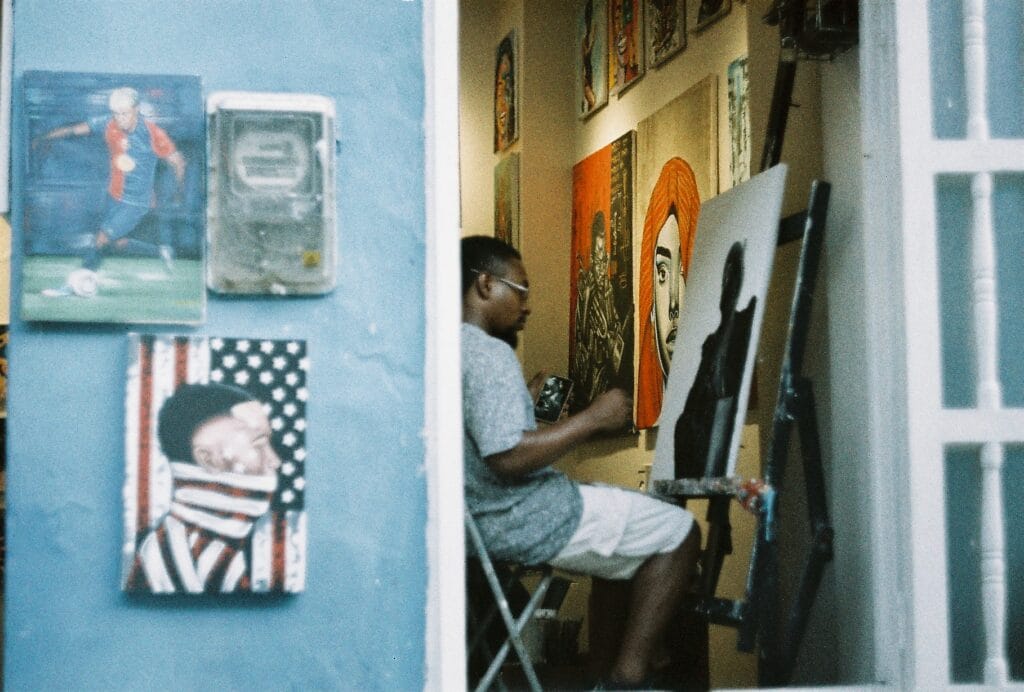 A painter in his shop in the streets of Cartagena